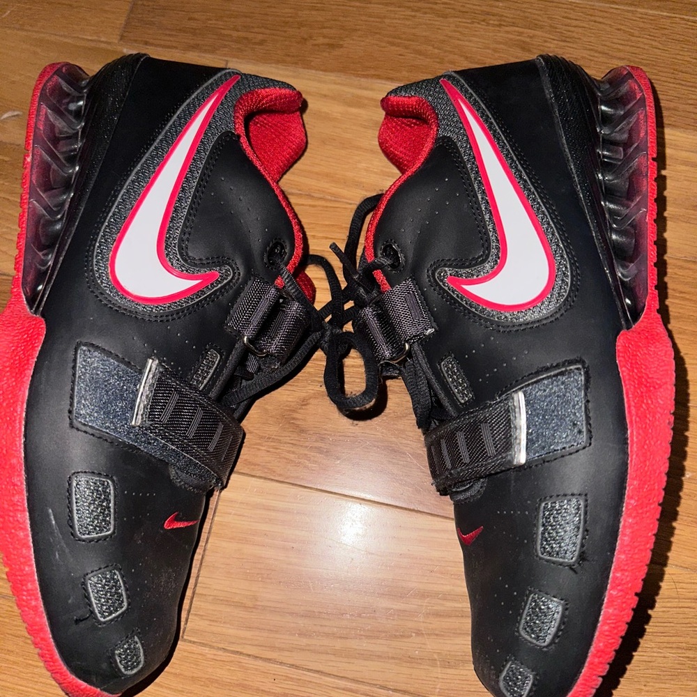 Men’s 11.5 Romaleo 2s Nike Black and Red Sports Sneakers